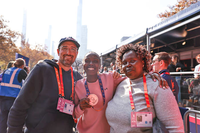 Sharon Lokedi smiles after the 2023 New York City Marathon.
